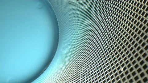 Pushing all the way down a curved metal grid. Wide angle macro view of the Stock Footage 162029172