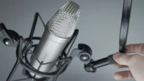 Pushing away studio microphone Stock Footage 130588351