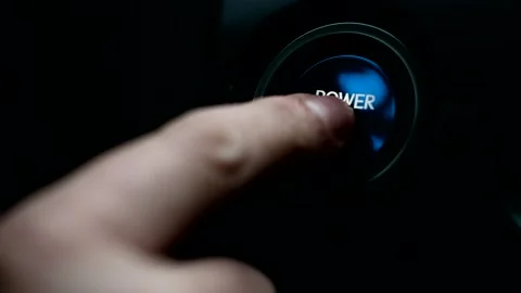 Pushing blue Power ignition Button to start keyless ignition hybrid car engin Stock Footage 145892509