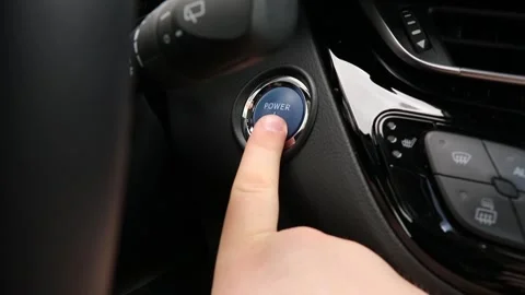 Pushing Blue Power Ignition Button To Start Keyless Ignition Hybrid Car Engin Stock Footage 151740015