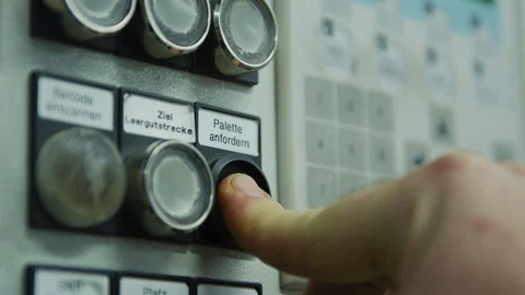 Pushing button in Automated Mass Production Plant - Automation Stock Footage 98650051