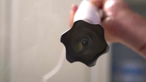 Pushing button on Hand blender in air Stockbeeldmateriaal 141992435