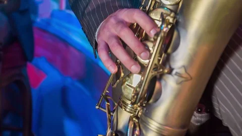 Pushing buttons on the saxophone Stock Footage 112189629