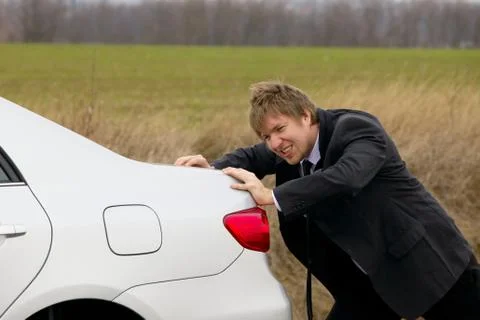 Pushing car Stock Photos