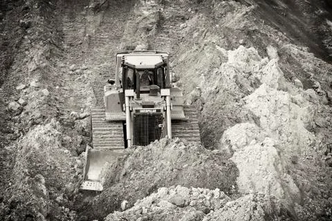 Pushing dirt Stock Photos