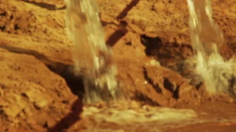 Pushing dirt water into a river Stock Footage 1008700