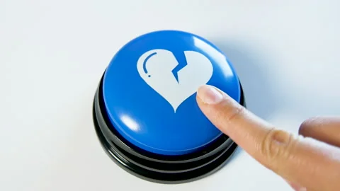 Pushing dislike button, broken heart symbol. Negative feedback on social media Stock Footage 142070014