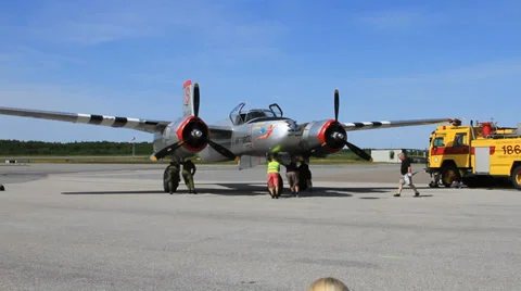 Pushing Douglas A26 Invader out onto runway Stock-Footage 27531868