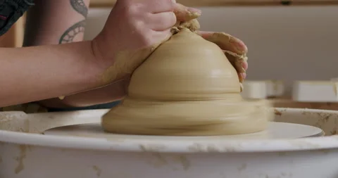 Pushing down on clay, Pottery Stock Footage 278727941