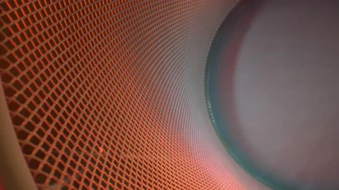 Pushing down the side of a brightly lit metal lattice grid. Wide angle Stock Footage 162447459