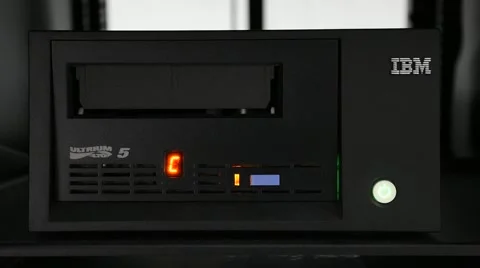 Pushing down tape into the tape drive on Computer Server Stock Footage 68166209