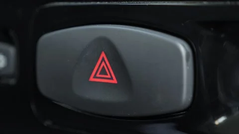 Pushing emergency stop button inside car Stock Footage 289485967