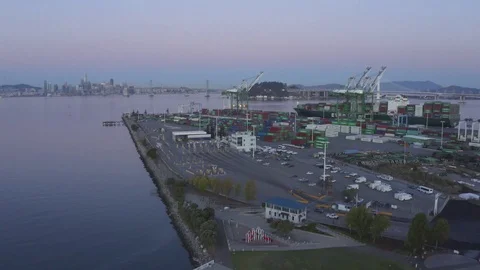 Pushing forward into the large crane yard in proximity to the shipping Stock Footage 117599996