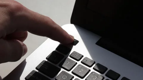 Pushing laptop power button Stock Footage 66756631