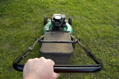 Pushing the Lawn Mower Stock Photos
