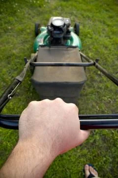 Pushing the Lawn Mower Stock Photos