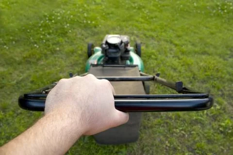 Pushing the Lawn Mower Stock Photos