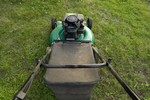 Pushing a Lawn Mower Stock Photos