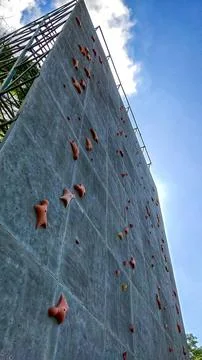Pushing Limits: Climbing Challenging Cliff Terrain Stock Photos
