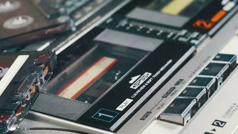 Pushing Play and Stop Button on the Vintage Audio Cassette Player Stock Footage 74638691