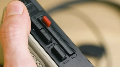 Pushing the PLAY Button on a Cassette Tape Player 库存影片 112043895