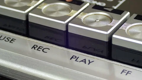 Pushing Play Button on a Vintage Tape Recorder Stock Footage 74874938