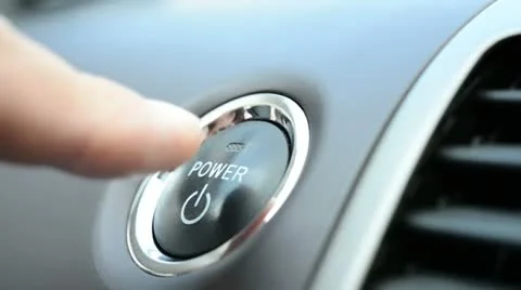 Pushing a power button in modern hybrid car Stock Footage 12129285