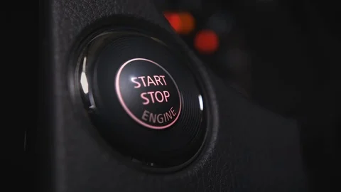 Pushing the power button to start engine. Stock Footage 75681579