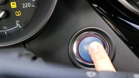 Pushing Power Ignition Button To Start Keyless Ignition Hybrid Car Engine Stock Footage 151739987
