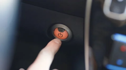 Pushing power ignition button to start stop keyless ignition hybrid electro car Video stock 196002680