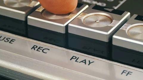 Pushing Record Button on a Vintage Tape Recorder Stock Footage 74899295