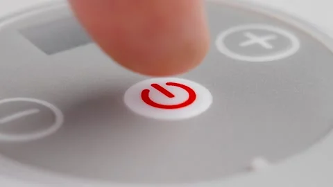 Pushing red button for device start Stock Footage 250595561