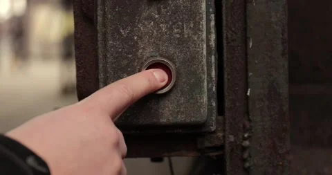Pushing the red button in a factory Stock Footage 305706053