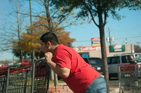 Pushing Shopping Carts Foto stock