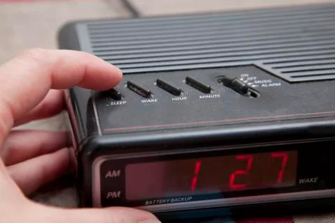 Pushing the sleep button Foto stock