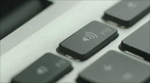 Pushing Sound Button on Laptop Keyboard Stock Footage 60383382