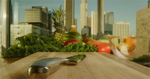 Pushing through composition of fruits and vegetables, sliding over cooking table Stockbeeldmateriaal 126302142