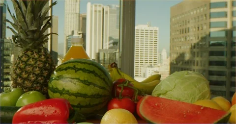 Pushing through composition of fruits and vegetables, sliding over cooking table Stockbeeldmateriaal 126304408