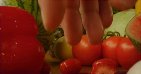 Pushing through composition of fruits and vegetables, sliding over cooking table 库存影片 126304492