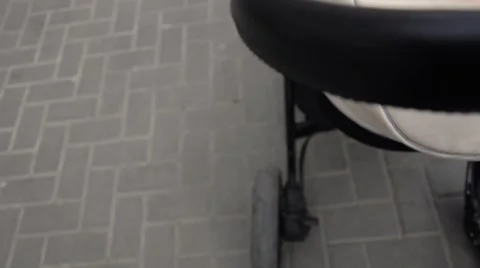 Pushing a trolley with baby Stock-Footage 62485879