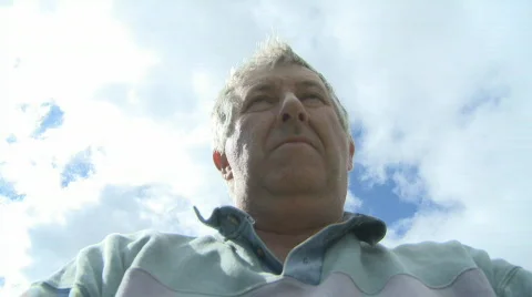 Pushing wheelbarrow face Stock Footage 349251