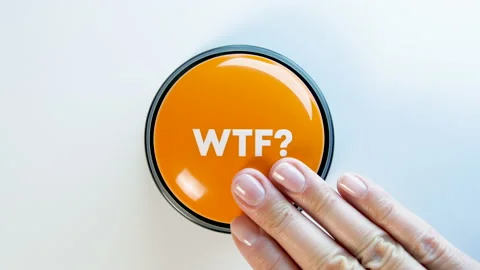Pushing WTF abbreviation button. What the Fuck? Annoyed, surprised expression. 動画素材 145949330
