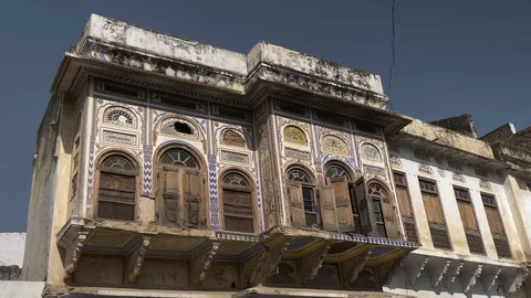 PUSHKAR, India - old, crumbling, ornately decorated buildings in Pushkar town Stock-Footage 87329236