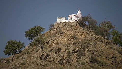 PUSHKAR, India - The Pap Mochani Temple on rocky hill outside Pushkar city 動画素材 87356021