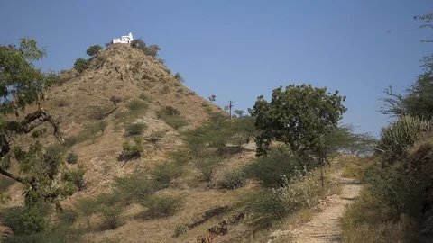 PUSHKAR, India - track leading up to The Pap Mochani Temple outside Pushkar town Stock-Footage 87355010