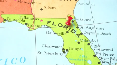 A pushpin is placed in the map of Florida Stock Footage 168759847