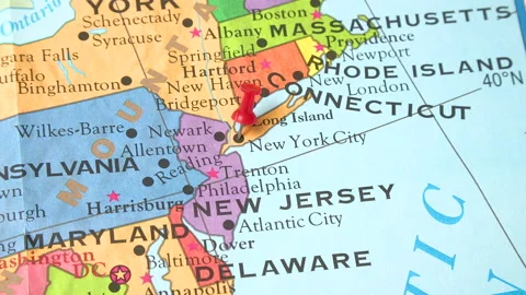 A pushpin is placed in the map of New York City Stock Footage 168759859