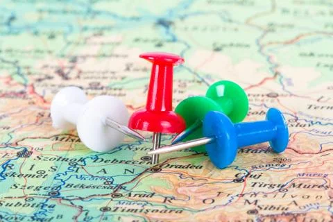 Pushpin pointing on map Stock Photos