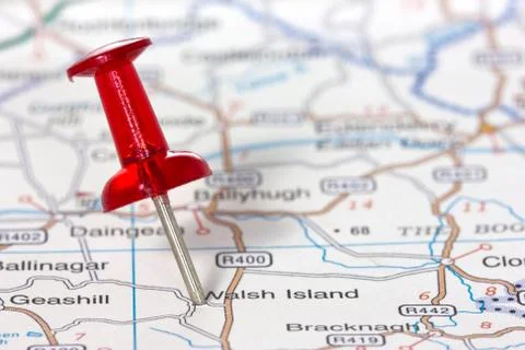 Pushpin showing the location on a map Stock Photos