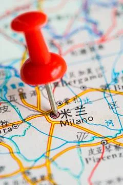 Pushpin stuck in the map Stock Photos